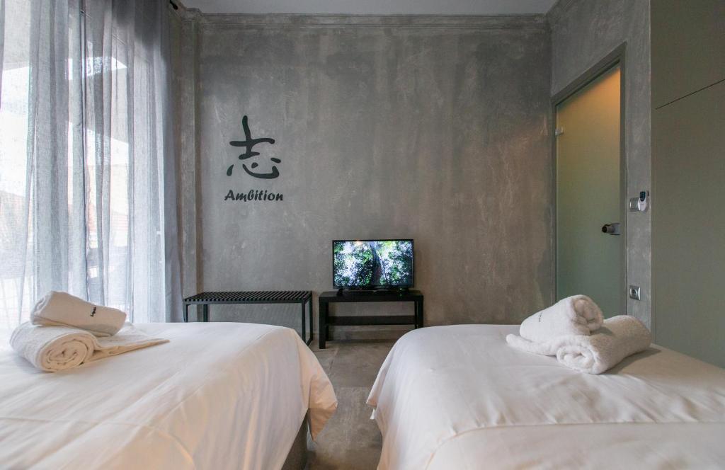 Postel nebo postele na pokoji v ubytování Lepanto Luxury Apartments FF