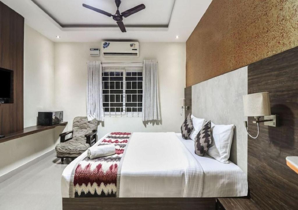Postel nebo postele na pokoji v ubytování Euphoria Extended Stays - OMR IT Expressway Chennai