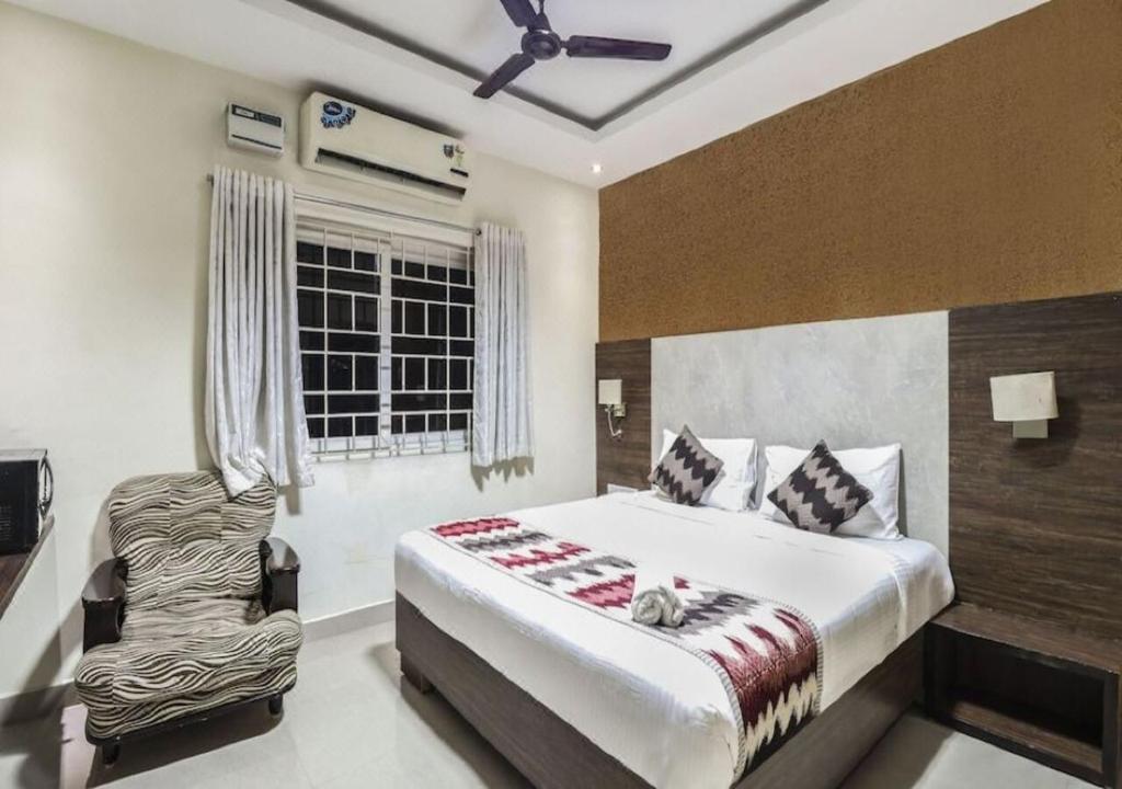 Postel nebo postele na pokoji v ubytování Euphoria Extended Stays - OMR IT Expressway Chennai