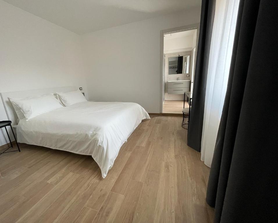 A bed or beds in a room at Casa Giulia