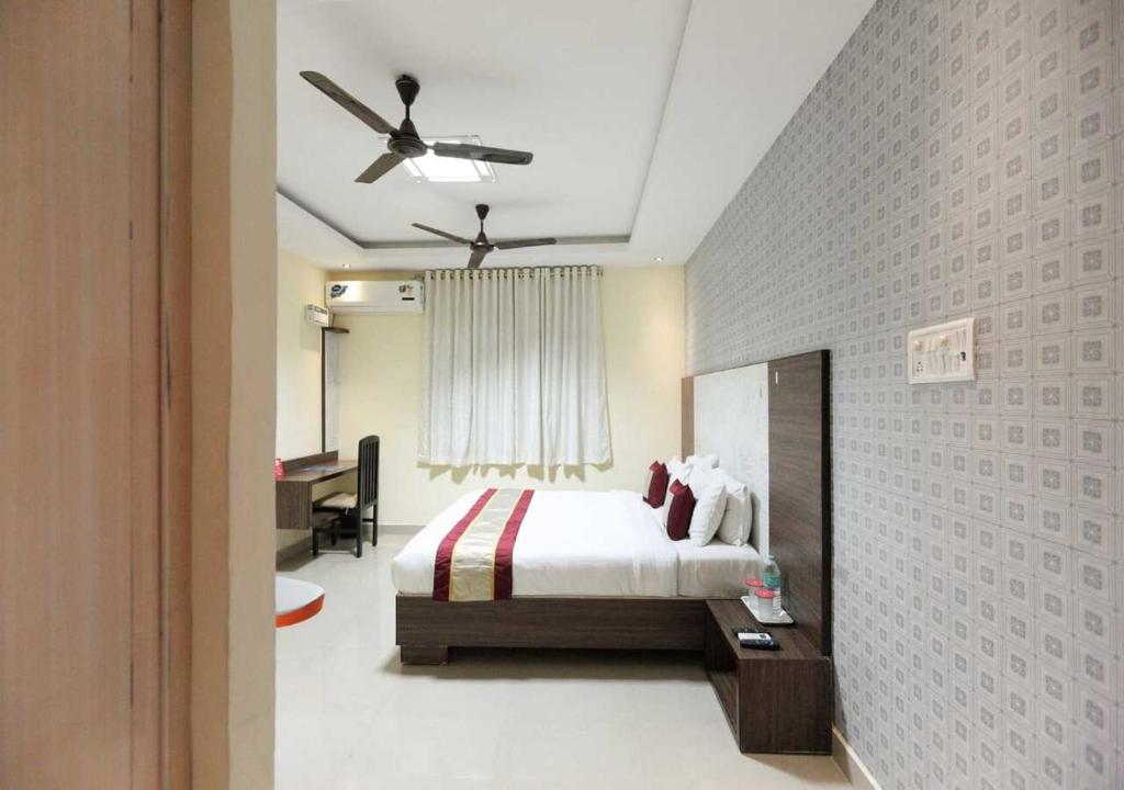 Postel nebo postele na pokoji v ubytování Euphoria Extended Stays - OMR IT Expressway Chennai