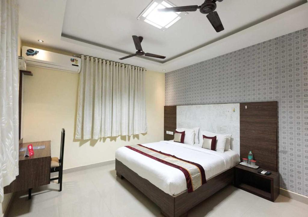 Postel nebo postele na pokoji v ubytování Euphoria Extended Stays - OMR IT Expressway Chennai