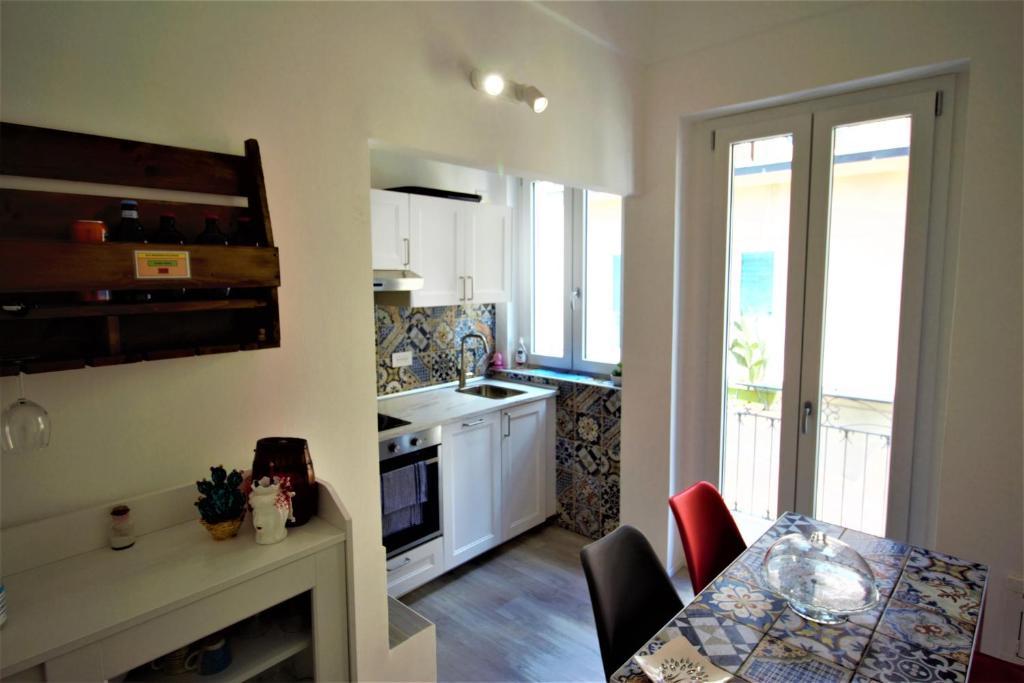 Kuchyň nebo kuchyňský kout v ubytování B&B Belvedere All'Idria