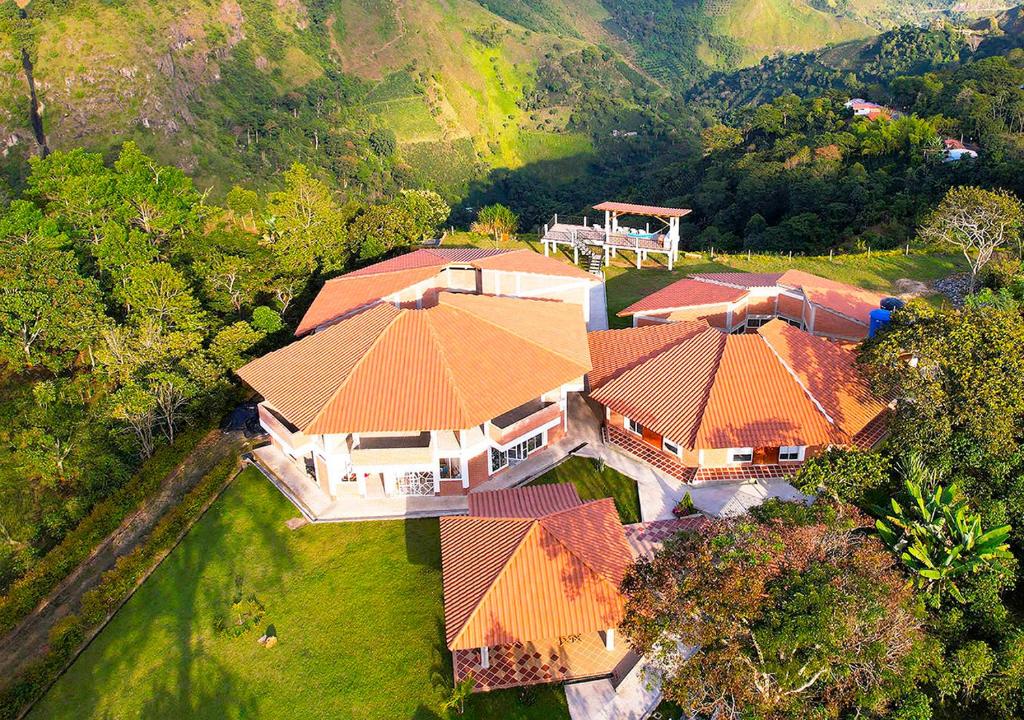 an overhead view of a house with orange roofs at Hotel Kasama in San Agustín