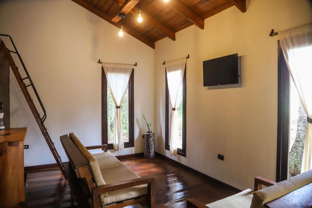 TV a/nebo společenská místnost v ubytování Cotan Ecolodge