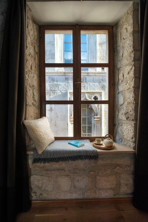Posteľ alebo postele v izbe v ubytovaní Loft in Ismaelli Palace Korcula