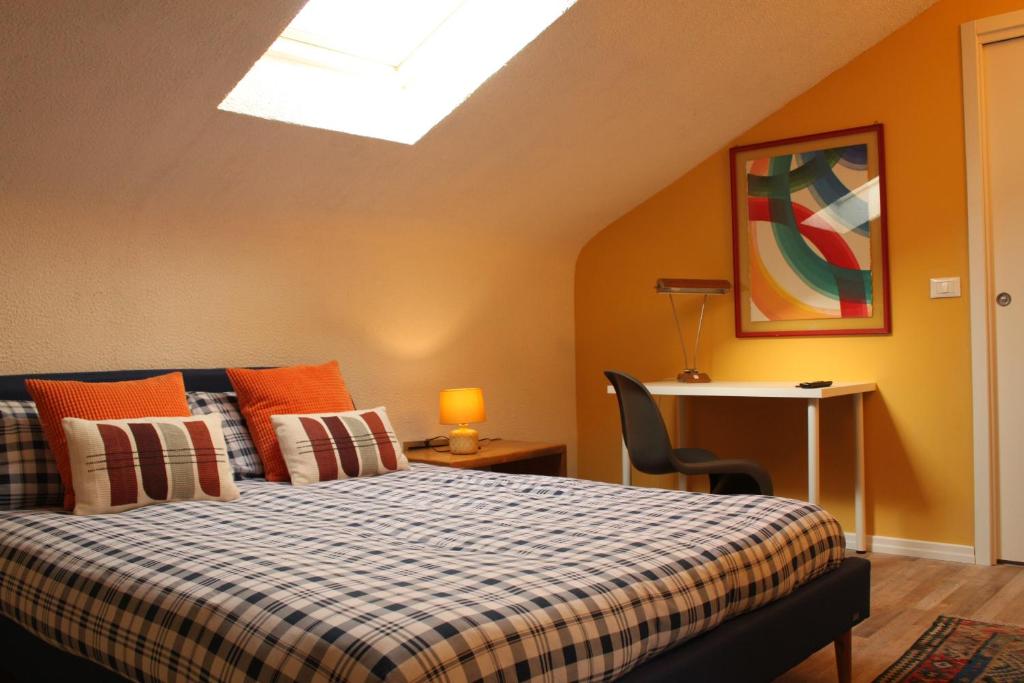 Łóżko lub łóżka w pokoju w obiekcie La Gare B&B Fiera