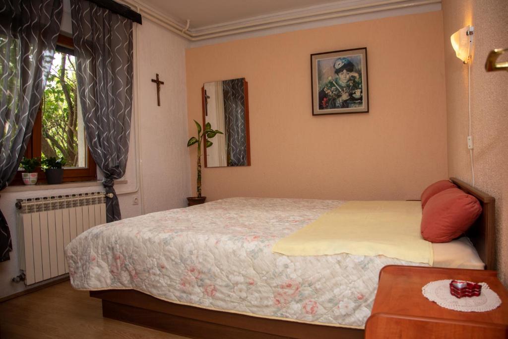 Postel nebo postele na pokoji v ubytování Apartman Žagar