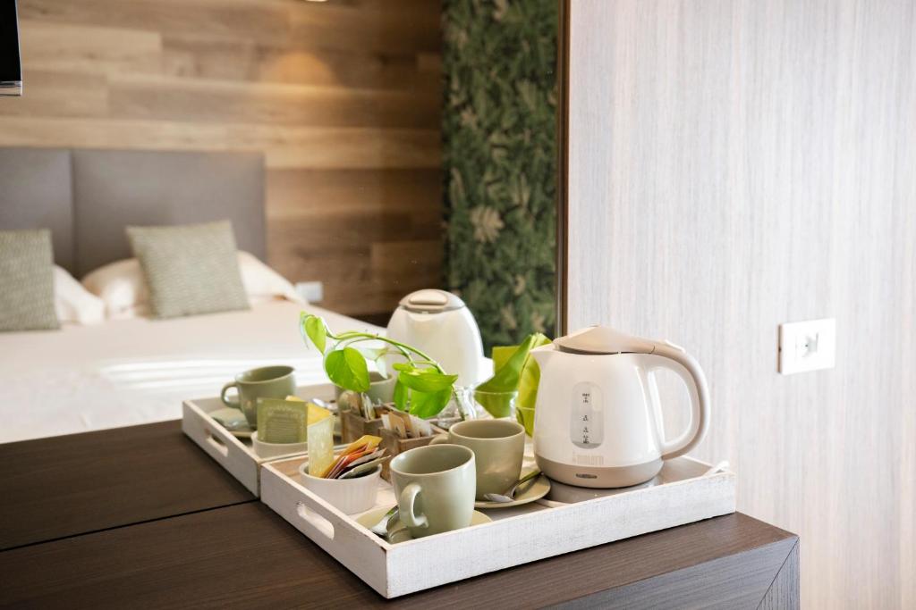 A bed or beds in a room at Bio Boutique Hotel XU' - Gruppo Ambienthotels