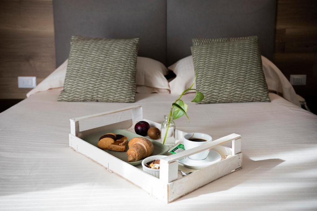 A bed or beds in a room at Bio Boutique Hotel XU' - Gruppo Ambienthotels