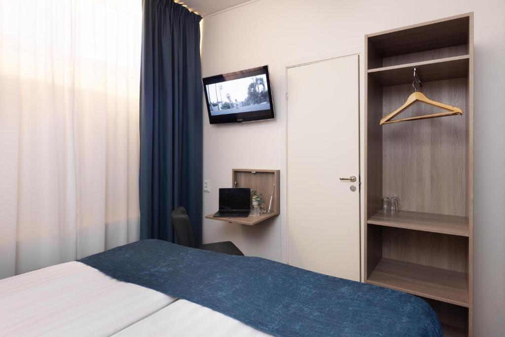 Postel nebo postele na pokoji v ubytování Hotel Söder