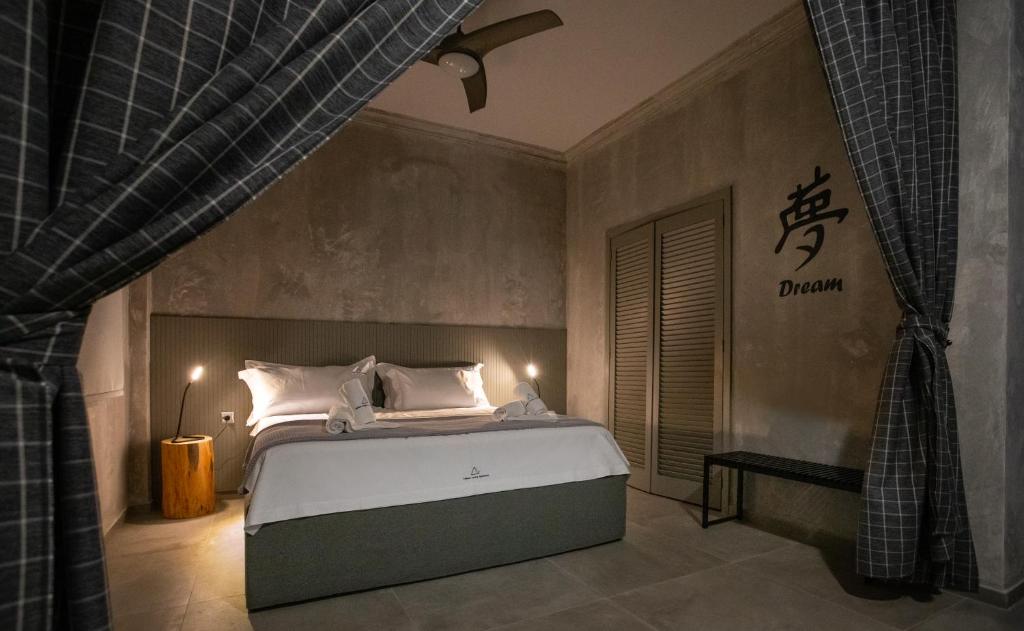Postel nebo postele na pokoji v ubytování Lepanto Luxury Apartments GF