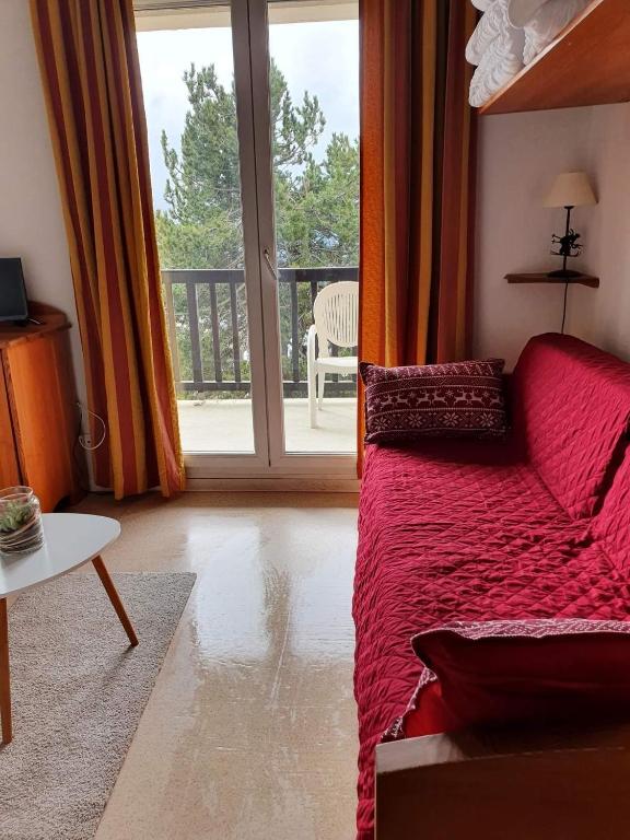 Postel nebo postele na pokoji v ubytování Charmant studio face aux Pyrénées