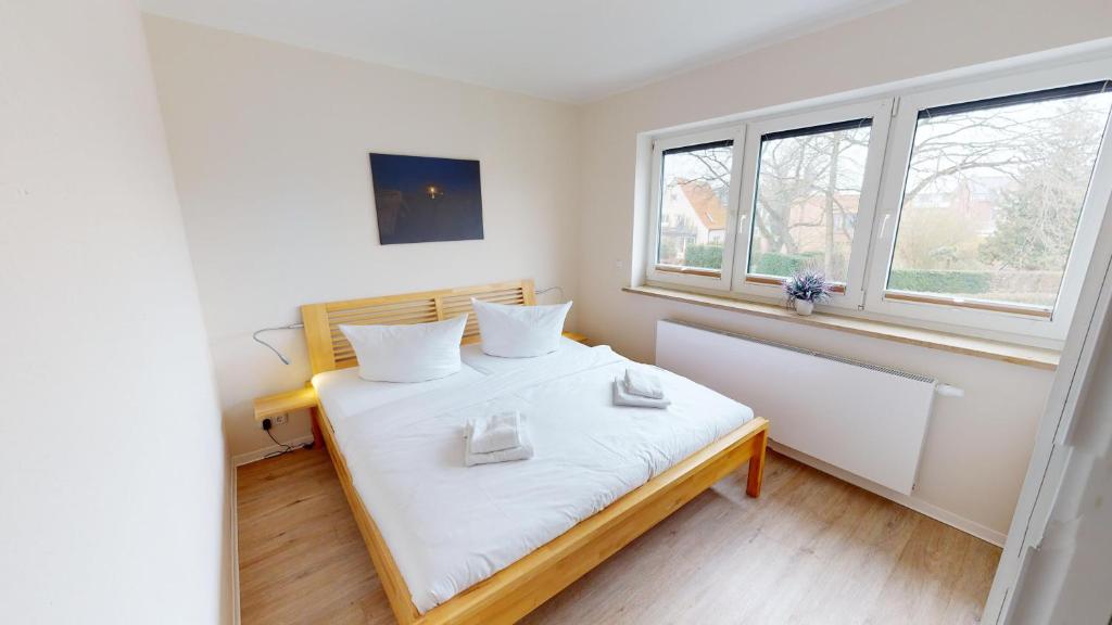 Postel nebo postele na pokoji v ubytování Das Solaris Ferienhaus