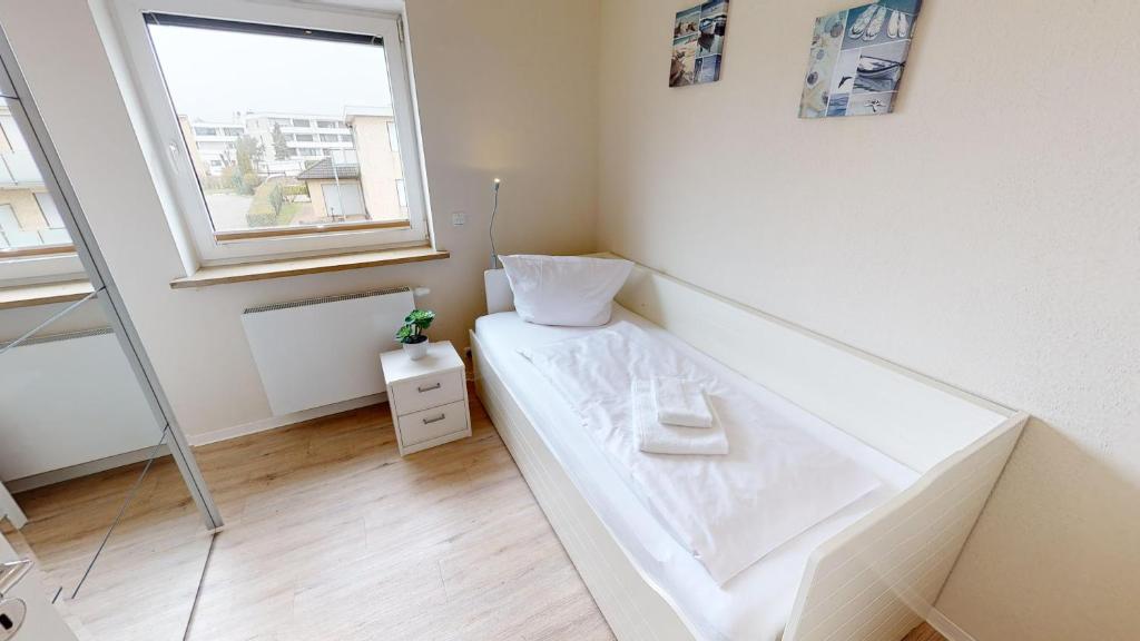 Postel nebo postele na pokoji v ubytování Das Solaris Ferienhaus