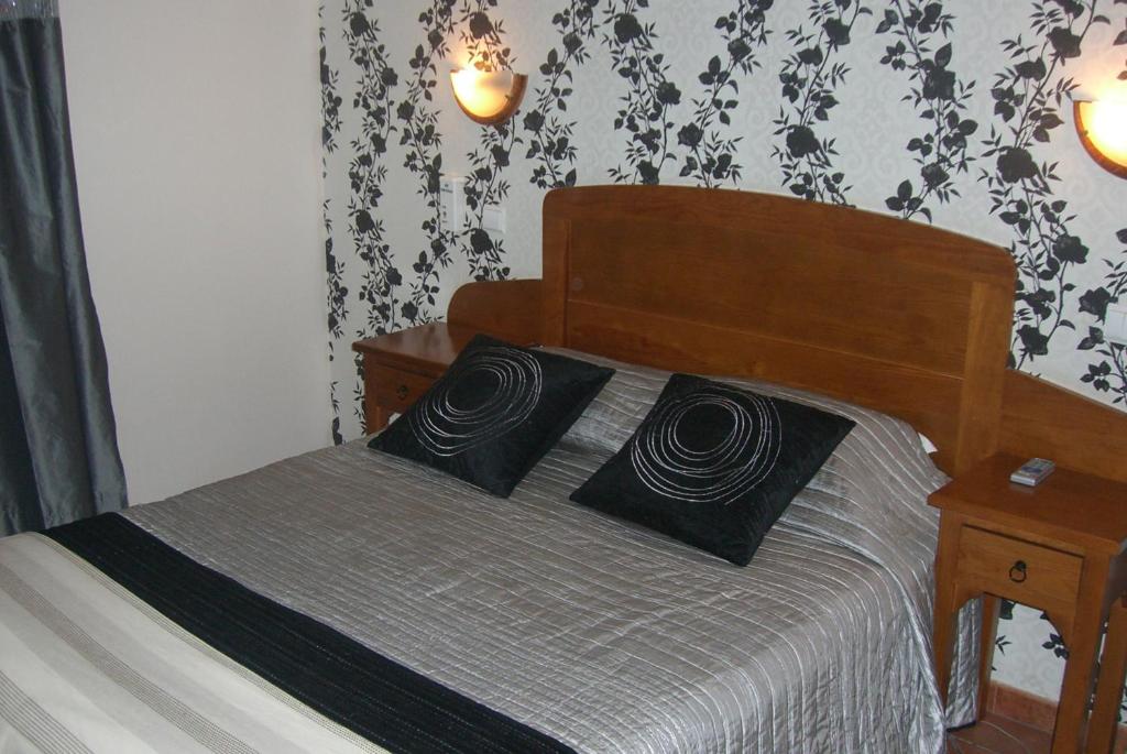 Ένα ή περισσότερα κρεβάτια σε δωμάτιο στο Hotel O Gadanha