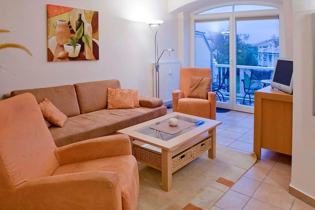 a living room with a couch and a coffee table at Apartment-Residenz Ostseestrand Apartment-Residenz Ostseestrand 37 in Kühlungsborn