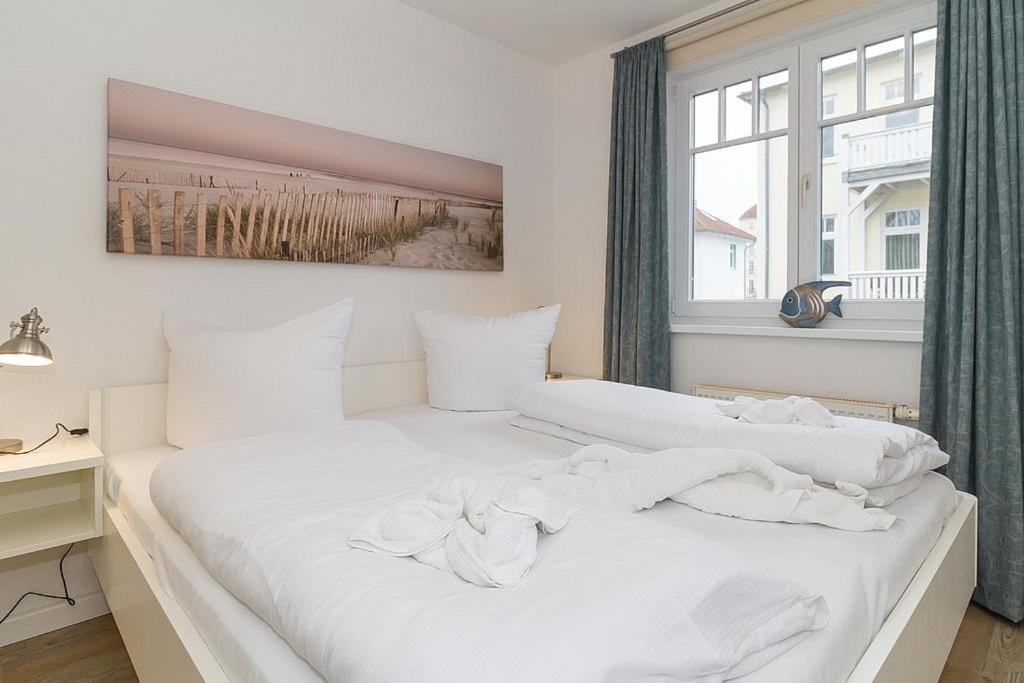 Postel nebo postele na pokoji v ubytování Strandstraße 32 Strandstraße 32-50
