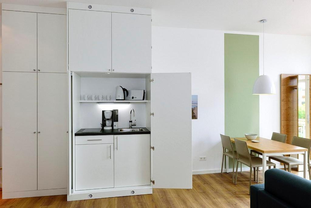 Kuchyň nebo kuchyňský kout v ubytování Aparthotel Anna Düne Aparthotel Anna Düne 0-02