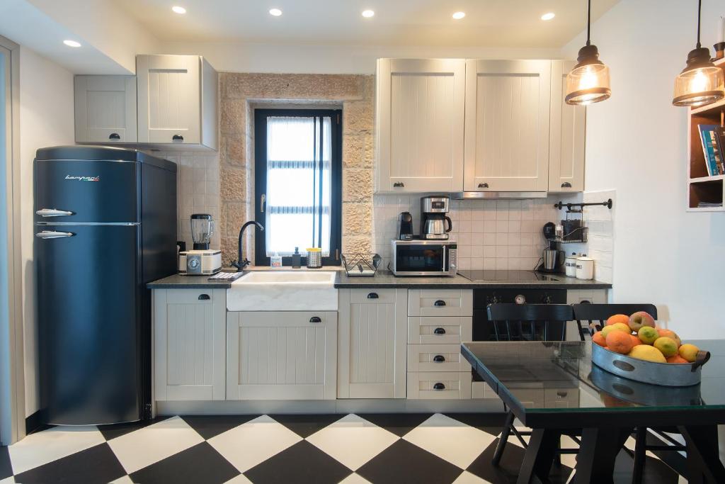A kitchen or kitchenette at Polismata - Private Residences