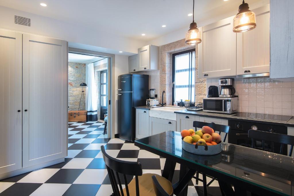 A kitchen or kitchenette at Polismata - Private Residences