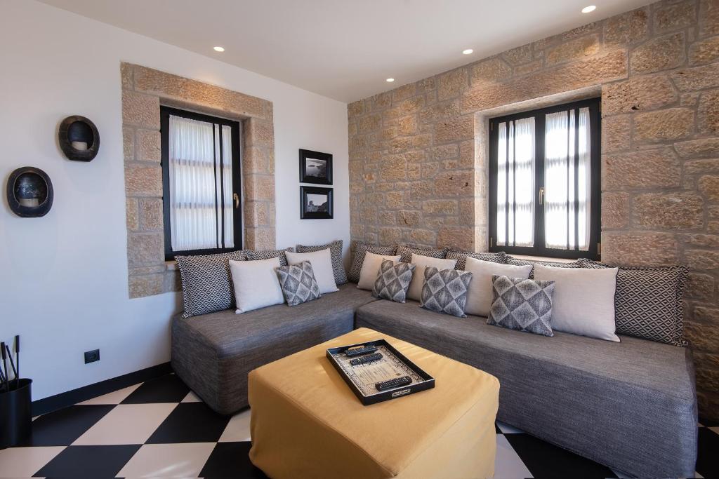 A seating area at Polismata - Private Residences