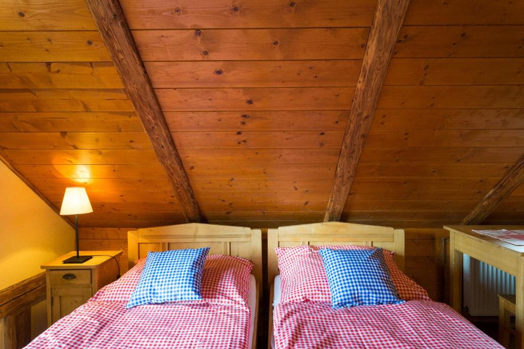 Postel nebo postele na pokoji v ubytování Penzion a hostinec Kyjovská terasa