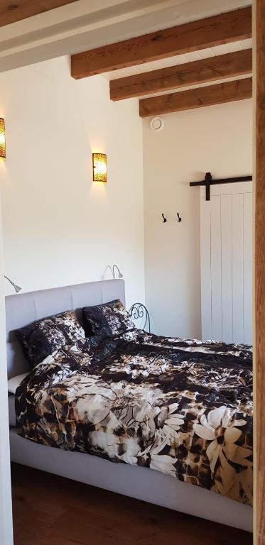 Postel nebo postele na pokoji v ubytování B&B Hoeve Ruimzicht