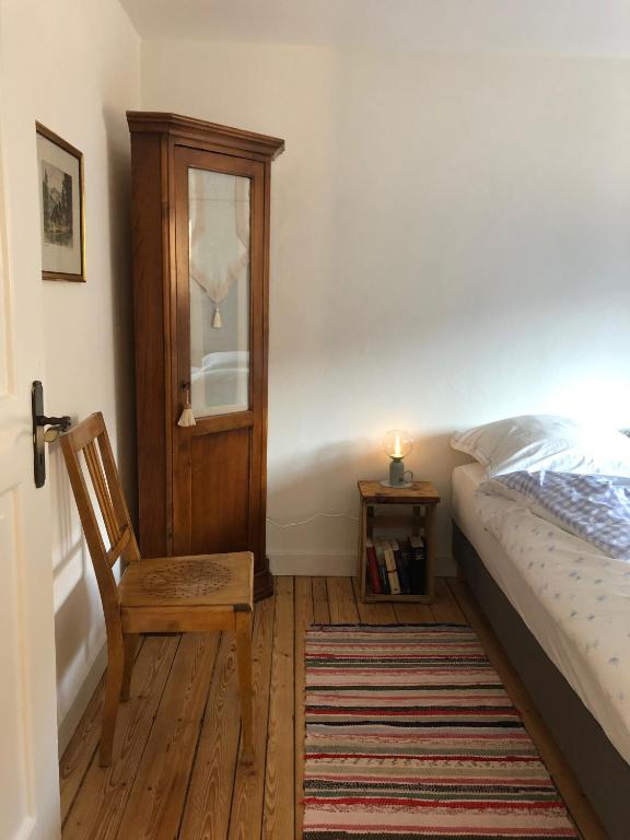 Postel nebo postele na pokoji v ubytování Ravenna Lodge