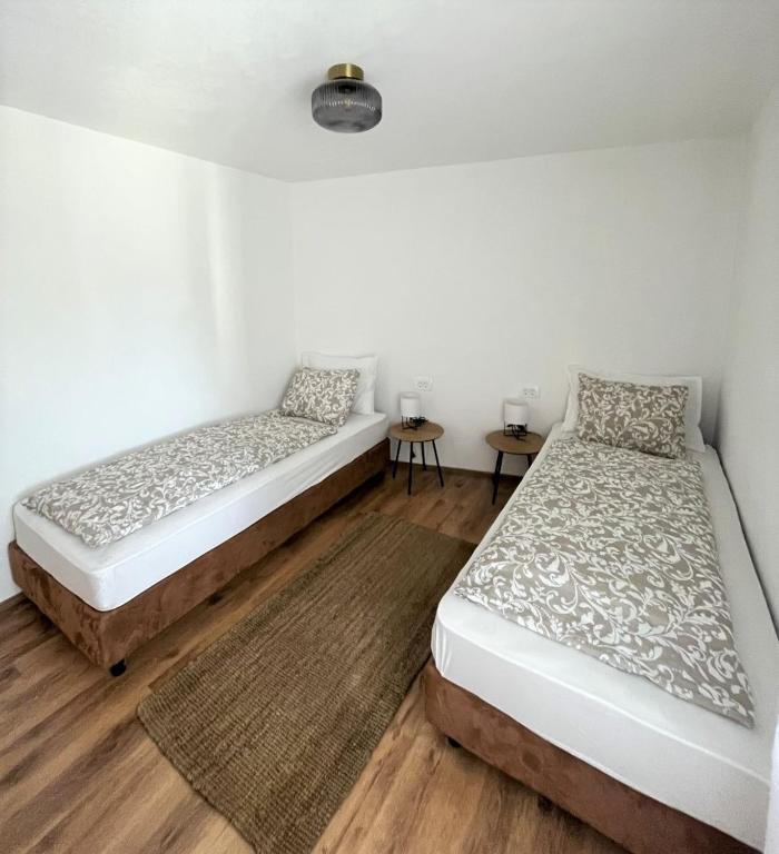 Postel nebo postele na pokoji v ubytování Apartment Lorun 47
