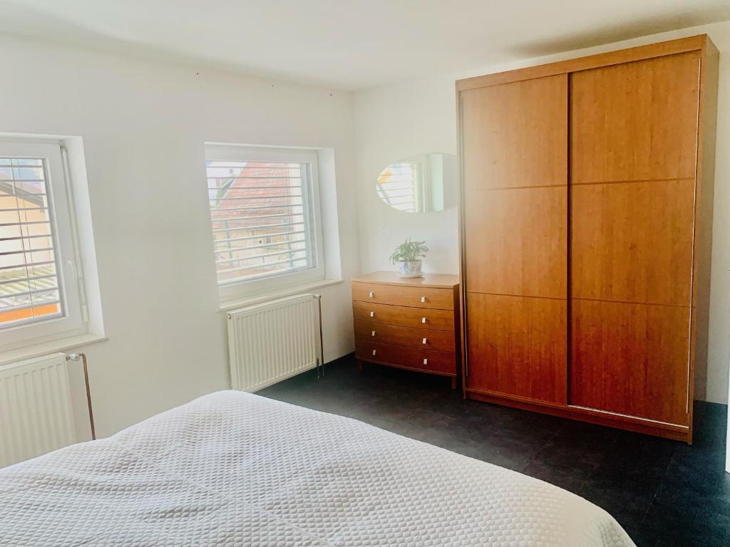 Posteľ alebo postele v izbe v ubytovaní Apartma FRIGO