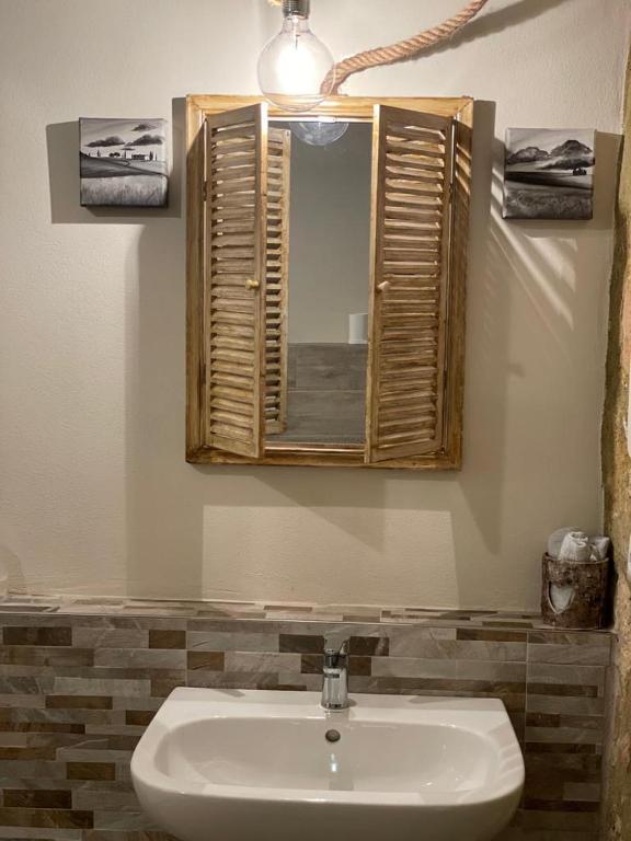 A bathroom at Pienzalettings