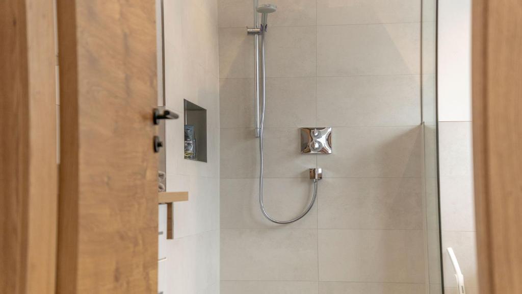 Koupelna v ubytování StuWip alps Appartements Adlerhorst