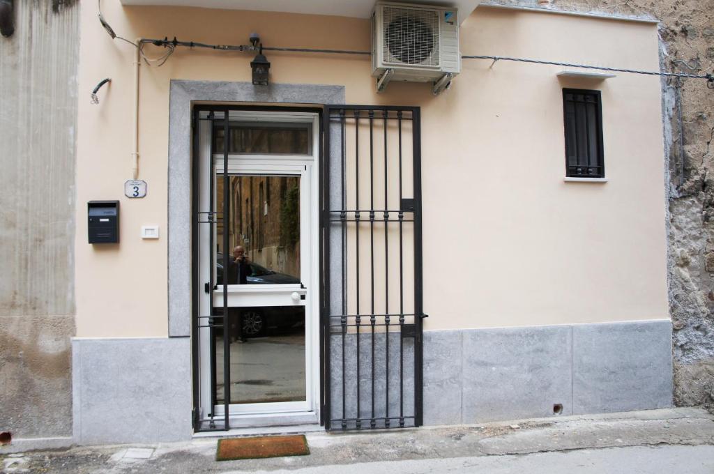 The facade or entrance of CATHEDRAL APARTMENT