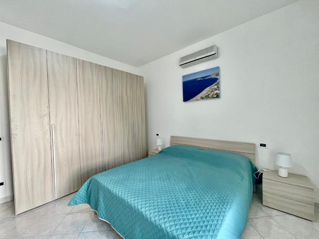 A bed or beds in a room at CASA VACANZE MARIAFRANCESCA