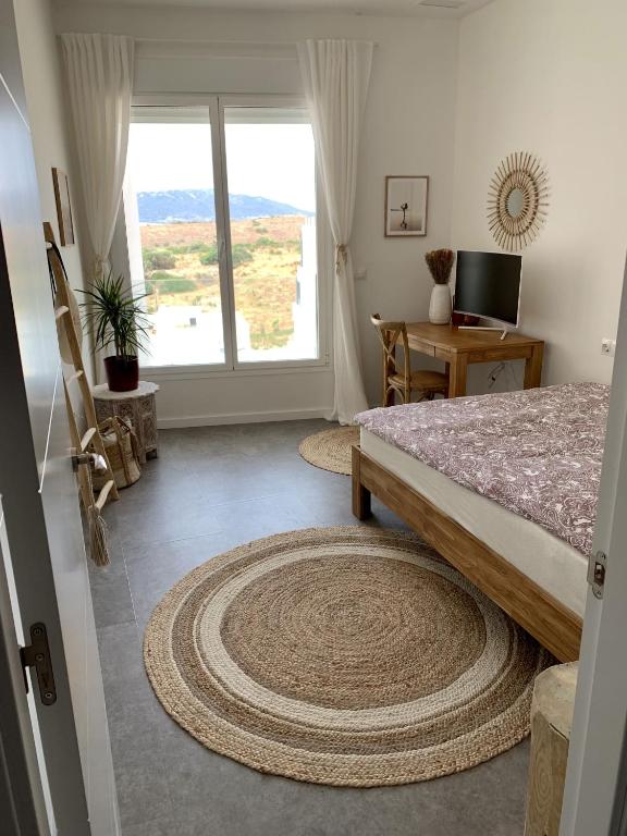 Postel nebo postele na pokoji v ubytování Sunset Ocean View Apartment mit Parking