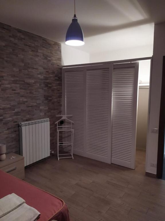 Postel nebo postele na pokoji v ubytování Domos Le Due Tuie