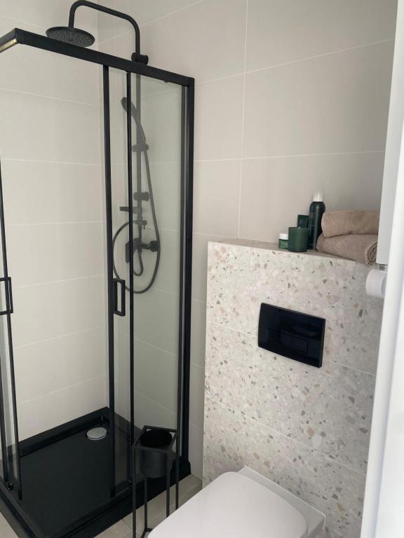 Kúpeľňa v ubytovaní Domki Widok Na Staw