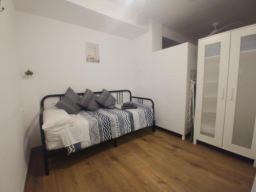 Posteľ alebo postele v izbe v ubytovaní mi apartamento 60