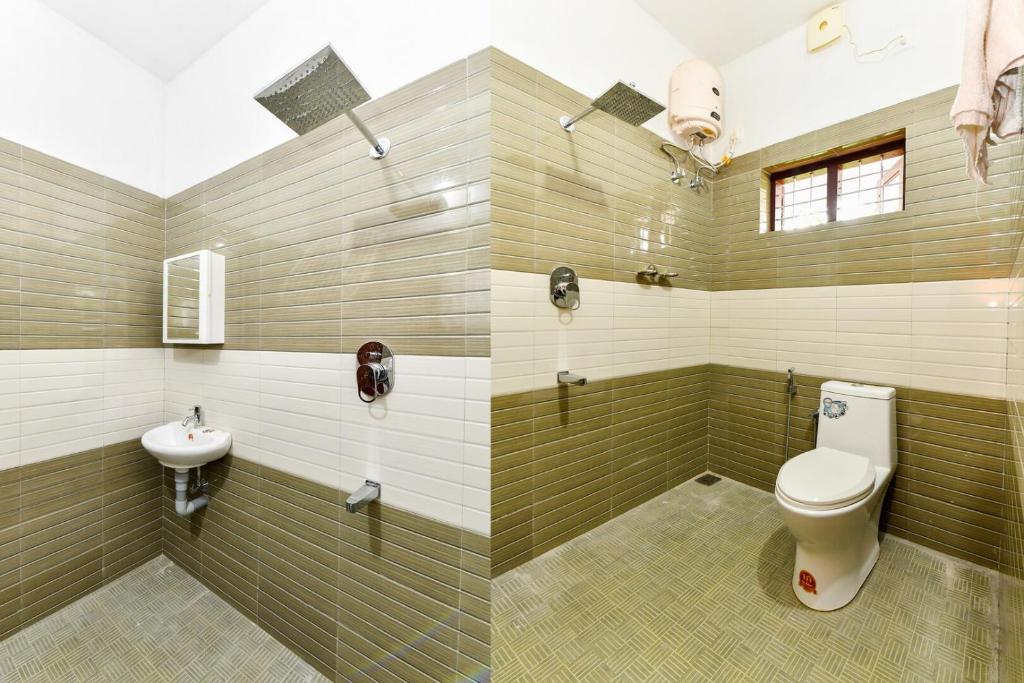 Koupelna v ubytování CentreHome Villa Wayanad