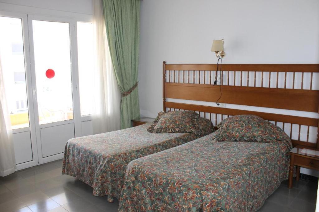 Postel nebo postele na pokoji v ubytování Hotel Montana by Bossh! Hotels