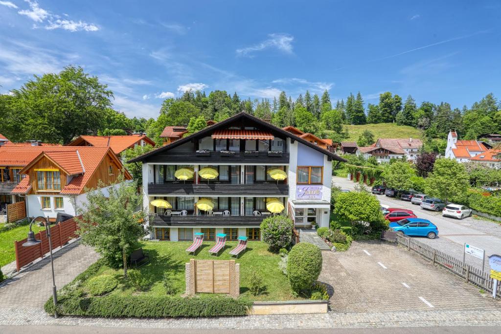 an aerial view of a house with a yard at Hotel Jakob in Füssen