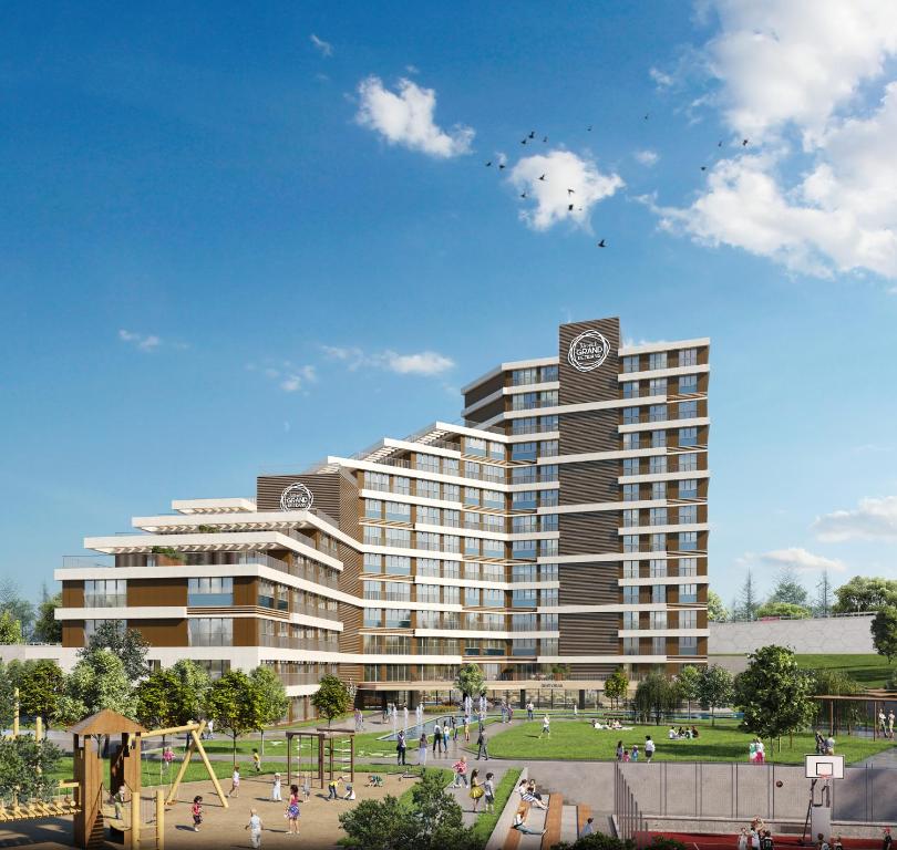 a rendering of a large building with a playground at Grand Residence by NewInn in Basaksehir