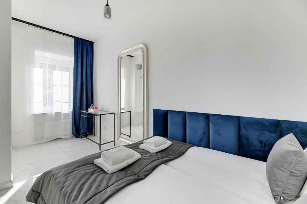 Posteľ alebo postele v izbe v ubytovaní Długa Boutique Apartment by Downtown Apartments