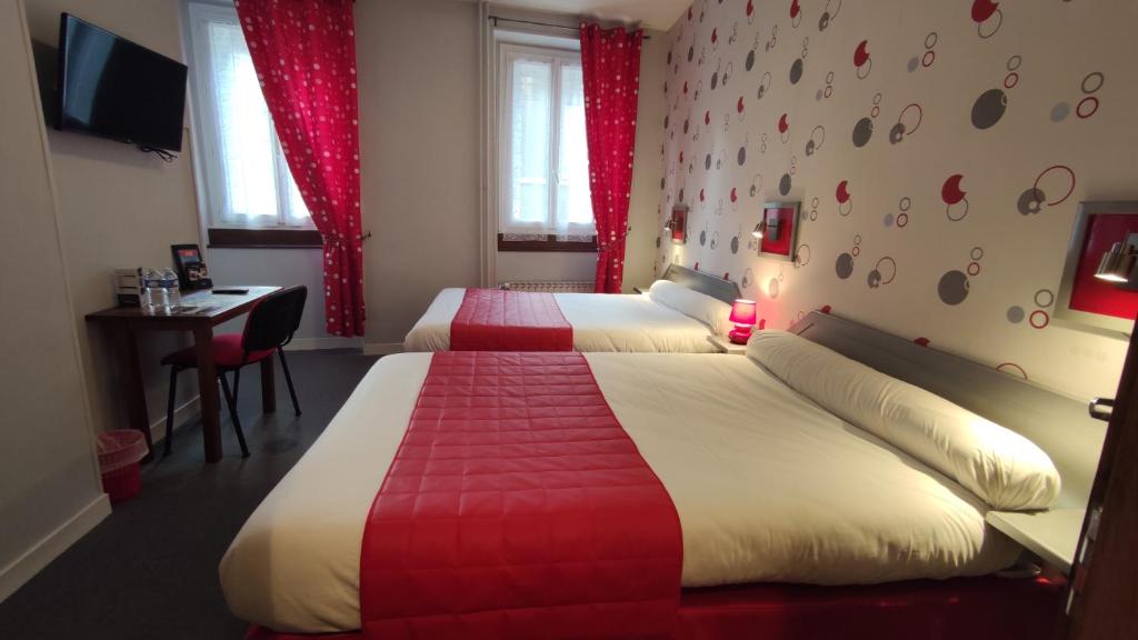 Postel nebo postele na pokoji v ubytování Hotel Angleterre