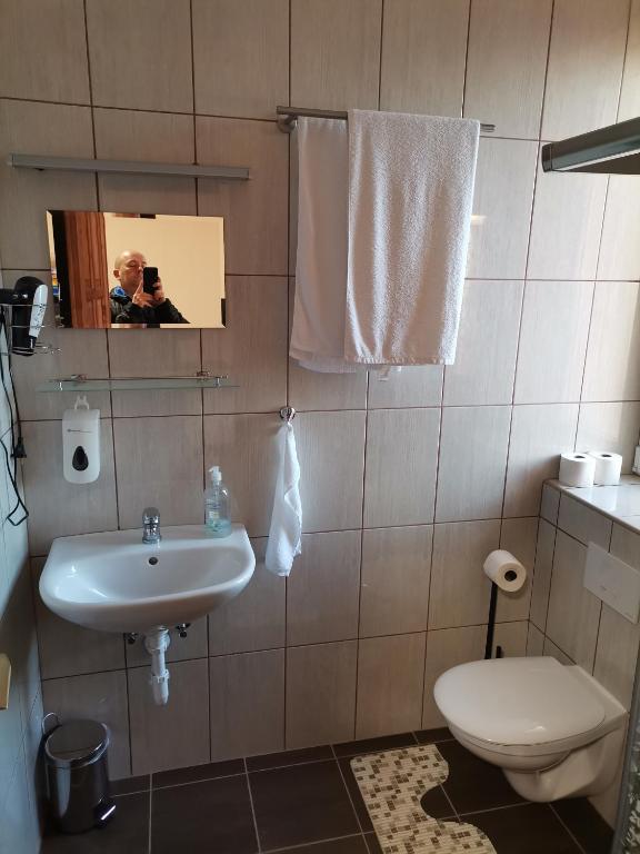 Koupelna v ubytování Ókerka Vendégház