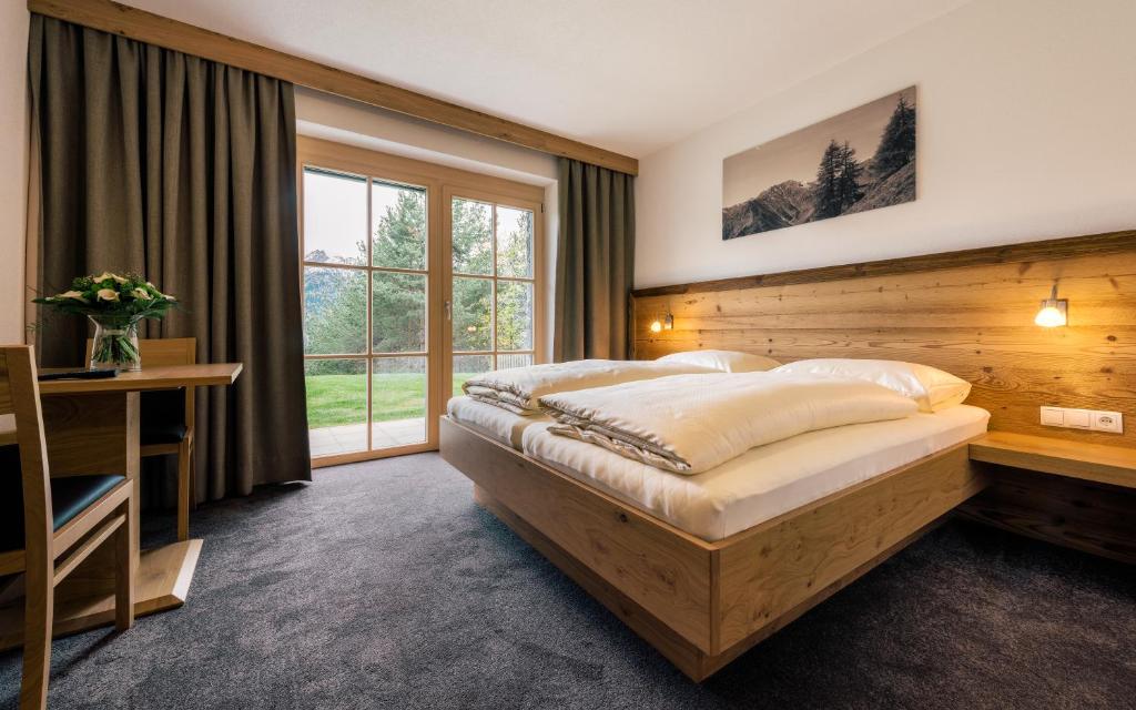 Posteľ alebo postele v izbe v ubytovaní Appartements Alexander