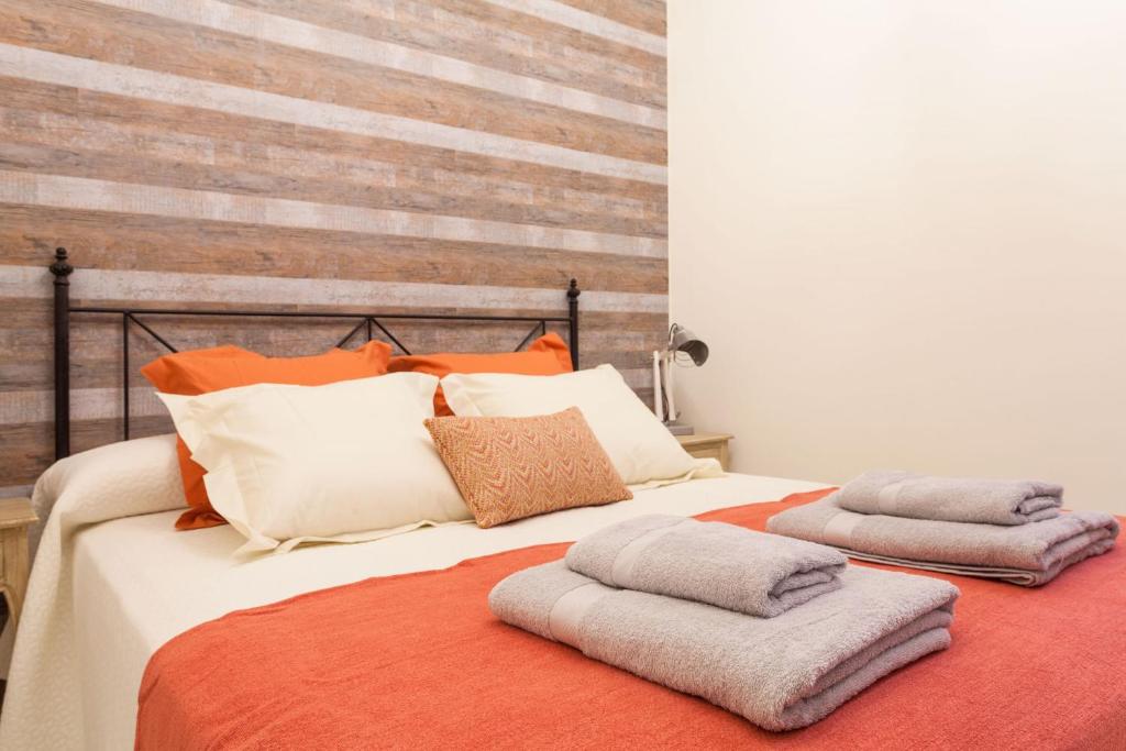 Posteľ alebo postele v izbe v ubytovaní Dream Apartments calle Zaragoza