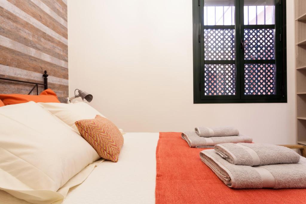 Posteľ alebo postele v izbe v ubytovaní Dream Apartments calle Zaragoza