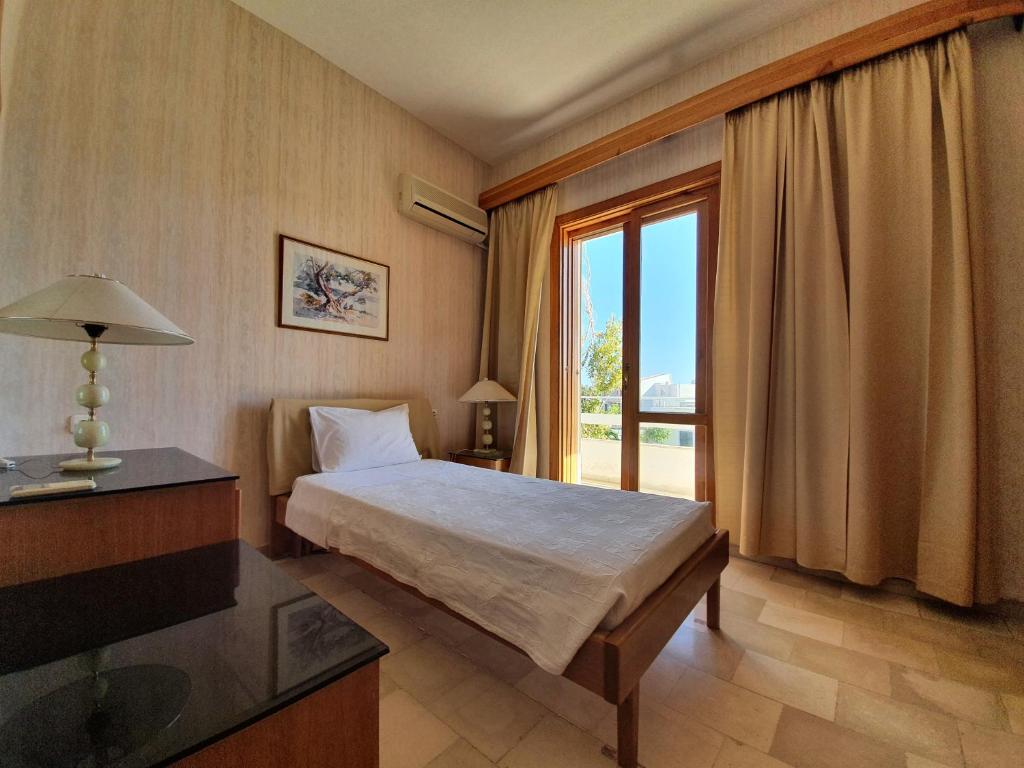 Postel nebo postele na pokoji v ubytování Hotel Elman